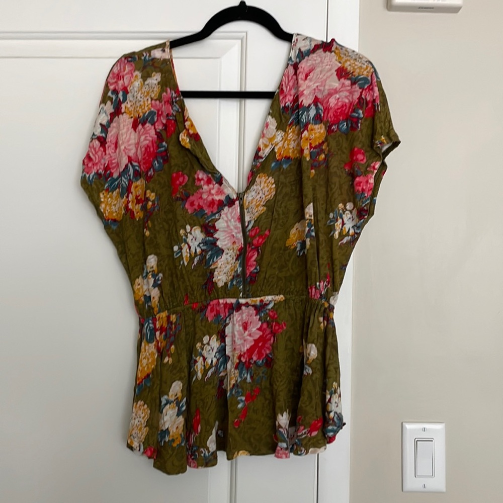 Cooperative floral top with zipper detail in front